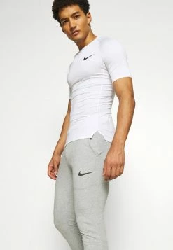 Nike Performance PANT TAPER - Tracksuit Bottoms - Dark Grey Heather/black -Nike Performance store 4c3d7851726e4a5c8183402209833094