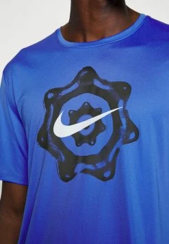 Nike Performance MILER - Sports T-shirt - Medium Blue -Nike Performance store 53e7cb98b8a04a0fa40cbf90debc1f1a