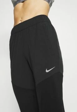 Nike Performance ESSENTIAL PANT - Tracksuit Bottoms - Black/silver -Nike Performance store 5563fb375ec04494898366c52c6c8b05