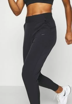 Nike Performance BLISS PANT - Tracksuit Bottoms - Black -Nike Performance store 5a395c02d6c54756ad5f924ffff84cef