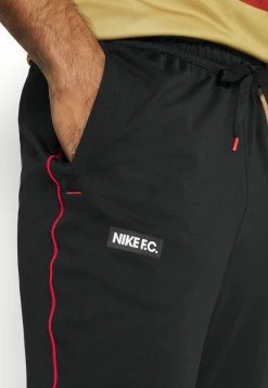 Nike Performance FC LIBERO PANT - Tracksuit Bottoms - Black/habanero Red/white -Nike Performance store 5b595b7264634a8489123e1d118fd810