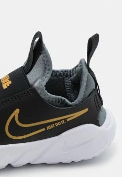 Nike Performance FLEX RUNNER 2 PSV UNISEX - Neutral Running Shoes - Black/metallic Gold/cool Grey/white -Nike Performance store 5d3ce0bb0b584a52b54148c2a5df1258