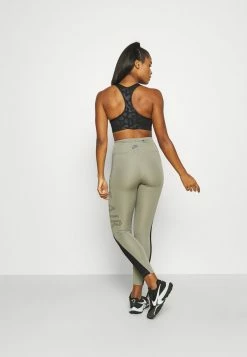 Nike Performance LEOPARD SHINE BRA - Medium Support Sports Bra - Black -Nike Performance store 5e5dc21e018245ada7891e988dc1e307