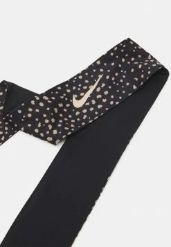 Nike Performance HEAD TIE REVERSIBLE - Sweatband - Black/hemp -Nike Performance store 66e35c2b2a9341349a7e70a29824014f