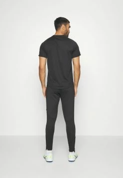 Nike Performance LIVERPOOL FC STRIKE PANT - Tracksuit Bottoms - Black/siren Red -Nike Performance store 6ad7b6af821f4c2ebbcd8022f60e8d37