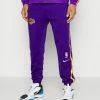 Nike Performance NBA LOS ANGELES LAKERS SHOWTIME DRY FIT PANT - Club Wear - Field Purple/amarillo/white
