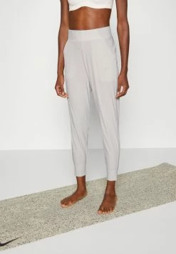 Nike Performance BLISS PANT - Tracksuit Bottoms - Light Iron/ore Clear