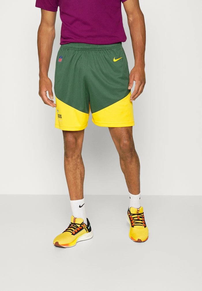 Nike Performance NFL GREEN BAY PACKERS MENS DRI-FIT SHORT - Sports Shorts - University Gold 1 Nike Performance NFL GREEN BAY PACKERS MENS DRI-FIT SHORT - Sports Shorts - University Gold
