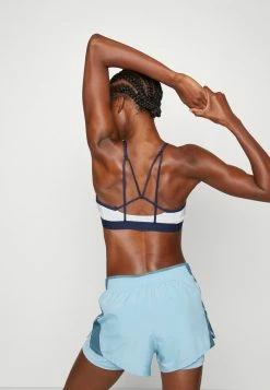 Nike Performance INDY LOGO BRA - Medium Support Sports Bra - Midnight Navy/football Grey/white -Nike Performance store 739cf4bdc51844f6832c433bc914428e