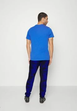 Nike Performance NETHERLANDS KNVB FLEECE PANT - Tracksuit Bottoms - Black/deep Royal Blue/habanero Red -Nike Performance store 7472fb47cd704190aefbbed492b2d3c5