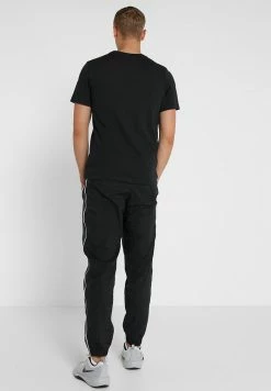 Nike Performance SOLID - Sports T-shirt - Black/white -Nike Performance store 76ce6cd1d2594b5ca0edb337fd7899c8