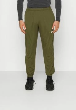 Nike Performance PANT - Tracksuit Bottoms - Rough Green/reflective Silver