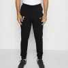 Nike Performance ATLETICO MADRID PANT - Club Wear - Black/peach Cream