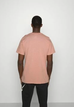 Nike Performance BURNOUT - Sports T-shirt - Rose Whisper/atmosphere/siren Red -Nike Performance store 7d120f834f5f4789beb535b3ea818c02