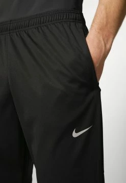 Nike Performance PANT - Tracksuit Bottoms - Black/reflective Silver 9 Nike Performance PANT - Tracksuit Bottoms - Black/reflective Silver -Nike Performance store 7fe0b3fdfd9a4647b279ec4351aface1