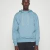 Nike Performance DRY FIT STANDARD HOODIE - Hoodie - Worn Blue/heather/pale Ivory