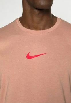 Nike Performance BURNOUT - Sports T-shirt - Rose Whisper/atmosphere/siren Red -Nike Performance store 805bf17683e74296a97750ffb63a699f