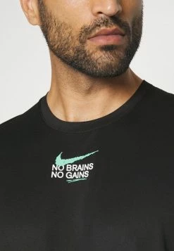 Nike Performance DRY DYE - Sports T-shirt - Black/light Menta -Nike Performance store 84746d1e61244ab7935d01cf4f31f364