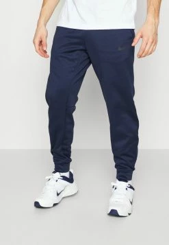 Nike Performance PANT TAPER - Tracksuit Bottoms - Obsidian/black