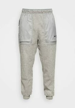 Nike Performance PANT TAPER NOVELTY - Tracksuit Bottoms - Dark Grey Heather/particle Grey/black -Nike Performance store 883a9d68476b41d6b4b444fdd6b19cd0