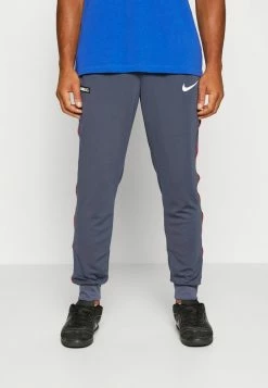 Nike Performance FC LIBERO PANT - Tracksuit Bottoms - Thunder Blue/habanero Red/white