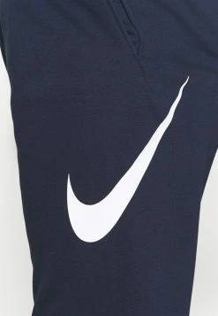 Nike Performance Tracksuit Bottoms - Obsidian/white -Nike Performance store 8d71f0ef7a38420699461bf1d02298ec