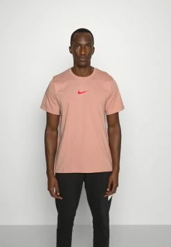 Nike Performance BURNOUT - Sports T-shirt - Rose Whisper/atmosphere/siren Red