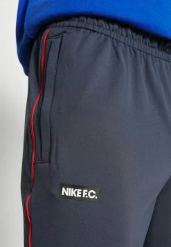 Nike Performance FC LIBERO PANT - Tracksuit Bottoms - Thunder Blue/habanero Red/white -Nike Performance store 90b43de1ad7e47fea8f59e5493641ff7