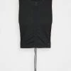 Nike Performance TANK TIE - Sports T-shirt - Black/iron Grey