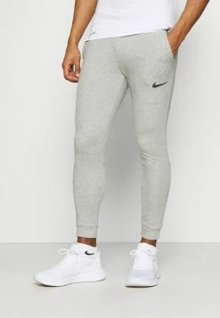 Nike Performance PANT TAPER - Tracksuit Bottoms - Dark Grey Heather/black