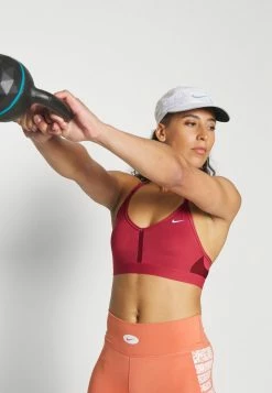 Nike Performance INDY V NECK BRA - Light Support Sports Bra - Canyon Rust/oxen Brown/white -Nike Performance store 964880160b2c4a198fac7cf29bf9fa2f