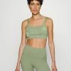 Nike Performance INDY BRA - Light Support Sports Bra - Oil Green/key Lime/iron Grey