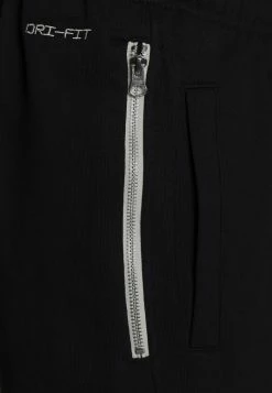 Nike Performance NBA NO TEAM STANDARD ISSUE PANT - Tracksuit Bottoms - Black/pale Ivory -Nike Performance store 9f2a9f1710c244a7bdeac595c2acaf18