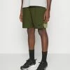 Nike Performance SHORT - Sports Shorts - Rough Green Alligator/black