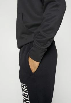 Nike Performance NBA BROOKLYN NETS COURTSIDE PANT - Tracksuit Bottoms - Black 15 Nike Performance NBA BROOKLYN NETS COURTSIDE PANT - Tracksuit Bottoms - Black -Nike Performance store a2f4c7da404345aa9627abdd33c3638d