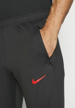 Nike Performance LIVERPOOL FC STRIKE PANT - Tracksuit Bottoms - Black/siren Red -Nike Performance store a6cecca0a28646a892c34cc574377445