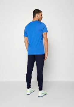 Nike Performance NIGERIA STRIKE PANT - Tracksuit Bottoms - Obsidian/white -Nike Performance store b6b7a04200d643e8a41d5ff1f3a191b5