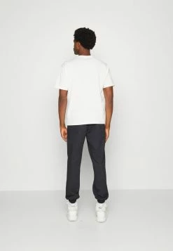 Nike Performance NBA NO TEAM STANDARD ISSUE PANT - Tracksuit Bottoms - Medium Ash Heather/pale Ivory -Nike Performance store ba7686a59709415691996fb4d76edf70