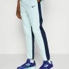 Nike Performance ADVANTAGE PANT - Tracksuit Bottoms - Light Blue/dark Blue