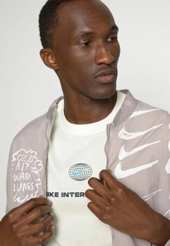 Nike Performance TEE HERITAGE - Sports T-shirt - Sail -Nike Performance store c3177d313c8544ed984a2b668c98ed84