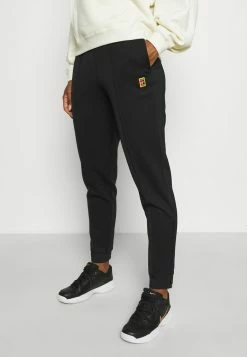 Nike Performance HERITAGE PANT - Tracksuit Bottoms - Black