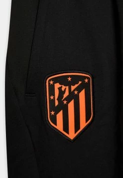 Nike Performance ATLETICO MADRID STRIKE PANT UNISEX - Tracksuit Bottoms - Black/atomic Orange -Nike Performance store caca10a94845418385be6ed9b73a8d27