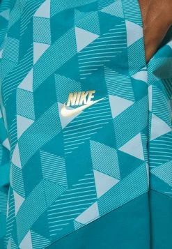 Nike Performance PANT - Tracksuit Bottoms - Bright Spruce/cave Purple/gold -Nike Performance store cd1345f8e68f47d5b72e85aab574f204