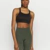 Nike Performance LUXE BRA - Medium Support Sports Bra - Black