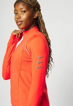Nike Performance RUN MIDLAYER - Long Sleeved Top - Light Crimson/black -Nike Performance store cf9874d2fc124078acae513eb17f61be