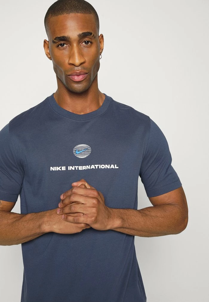 Nike Performance TEE HERITAGE - Sports T-shirt - Thunder Blue 5 Nike Performance TEE HERITAGE - Sports T-shirt - Thunder Blue - Image 5