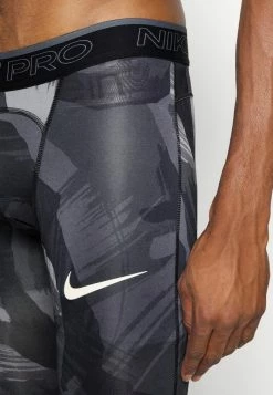 Nike Performance CAMO - Leggings - Black/coconut Milk -Nike Performance store d46e2a6d529649efb0f106817dac5fa5