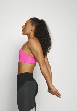 Nike Performance BRA - Medium Support Sports Bra - Pinksicle/white -Nike Performance store d4d235e779024c61835348e6f5739df0