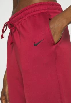 Nike Performance THERMA FIT ALL TIME - Tracksuit Bottoms - Pomegranate/black -Nike Performance store d72a47223b4f4169ac0bcc03e1353286