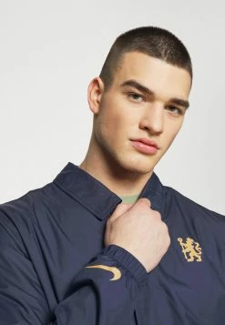 Nike Performance CHELSEA LONDON COACH - Club Wear - Blackened Blue/jersey Gold 9 Nike Performance CHELSEA LONDON COACH - Club Wear - Blackened Blue/jersey Gold -Nike Performance store df51e34c64374dff91215ec1243ea5d2